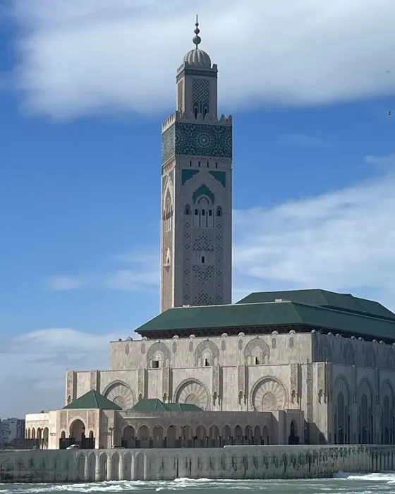 The Hassan II Mosque in Casablanca, its minaret rising above the Atlantic waves