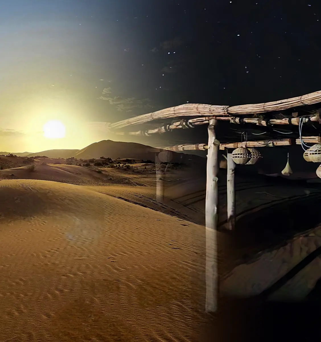 Evening light fading over the desert dunes