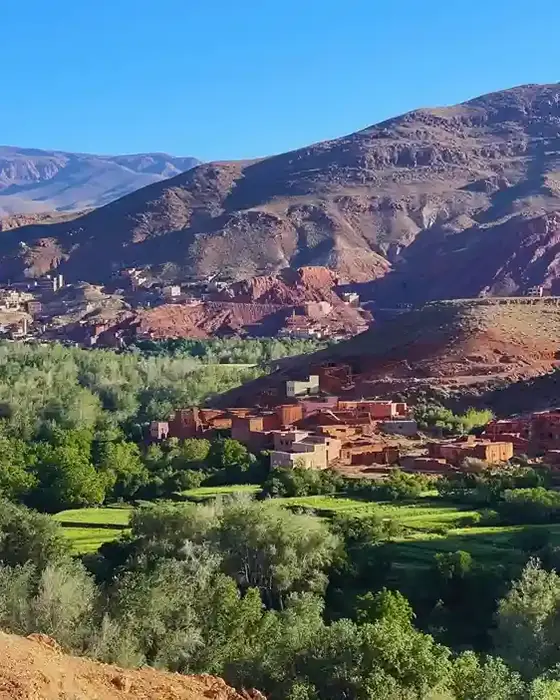 Red earth villages and green fields below the mountains of the Dades Valley